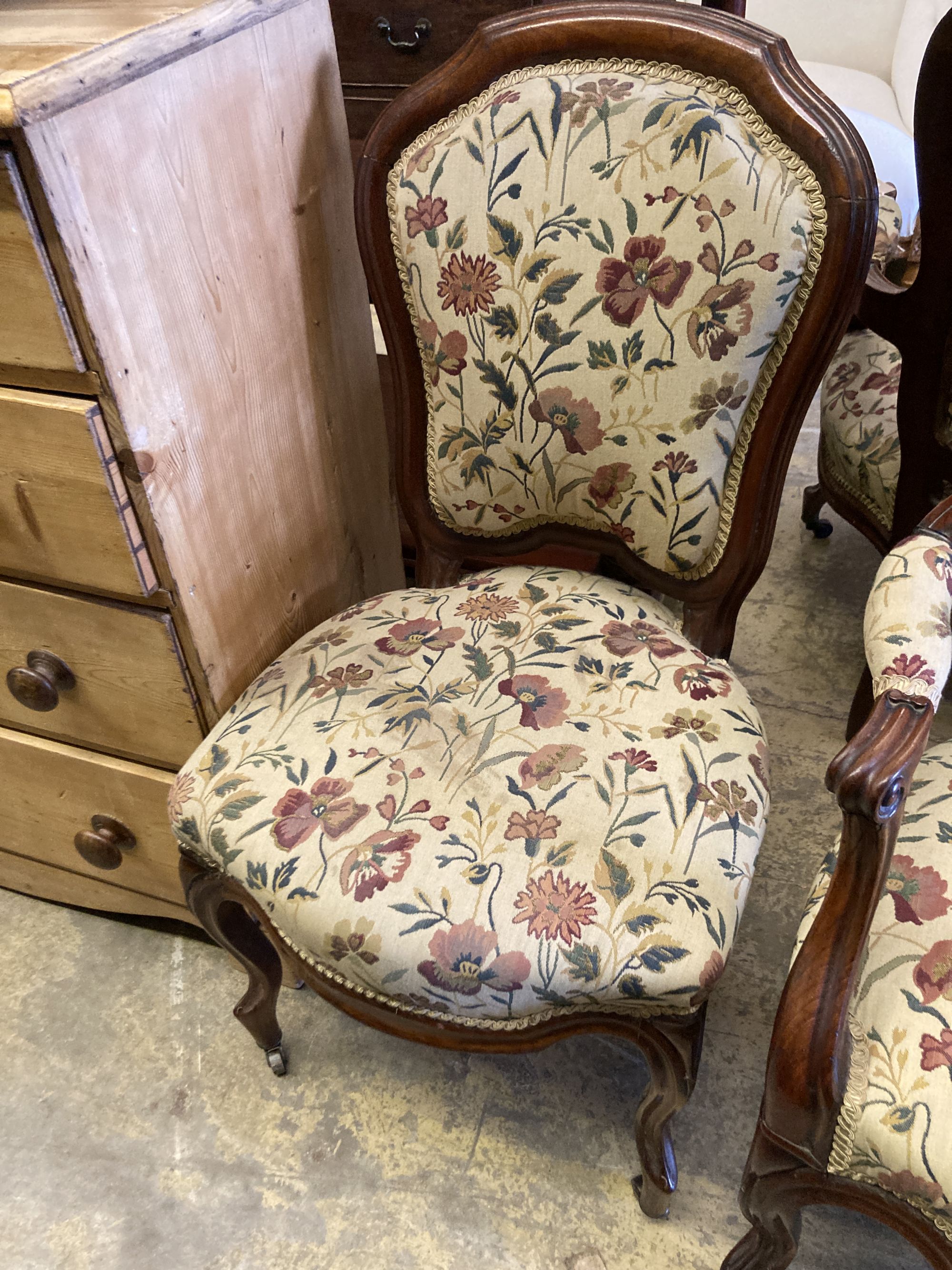 A pair of 19th century German mahogany armchairs and two side chairs